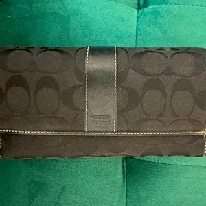 Black coach wallet.